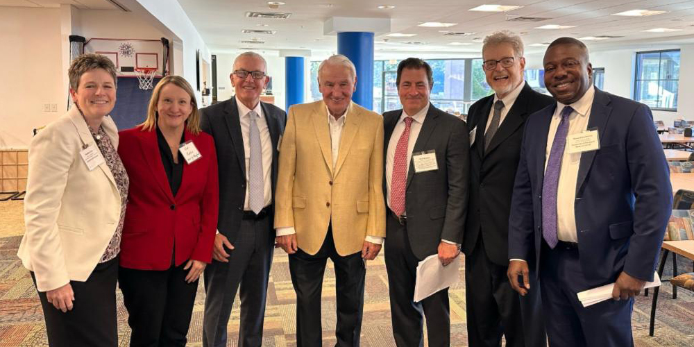 UMB and UMMS representatives gather with philanthropist Tom Golisano