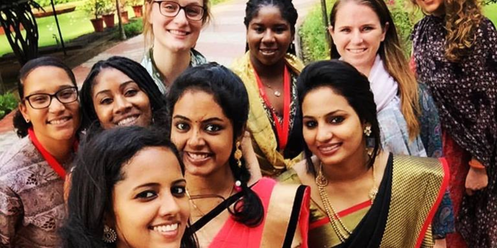 SSW students pose for a group photo outside in India