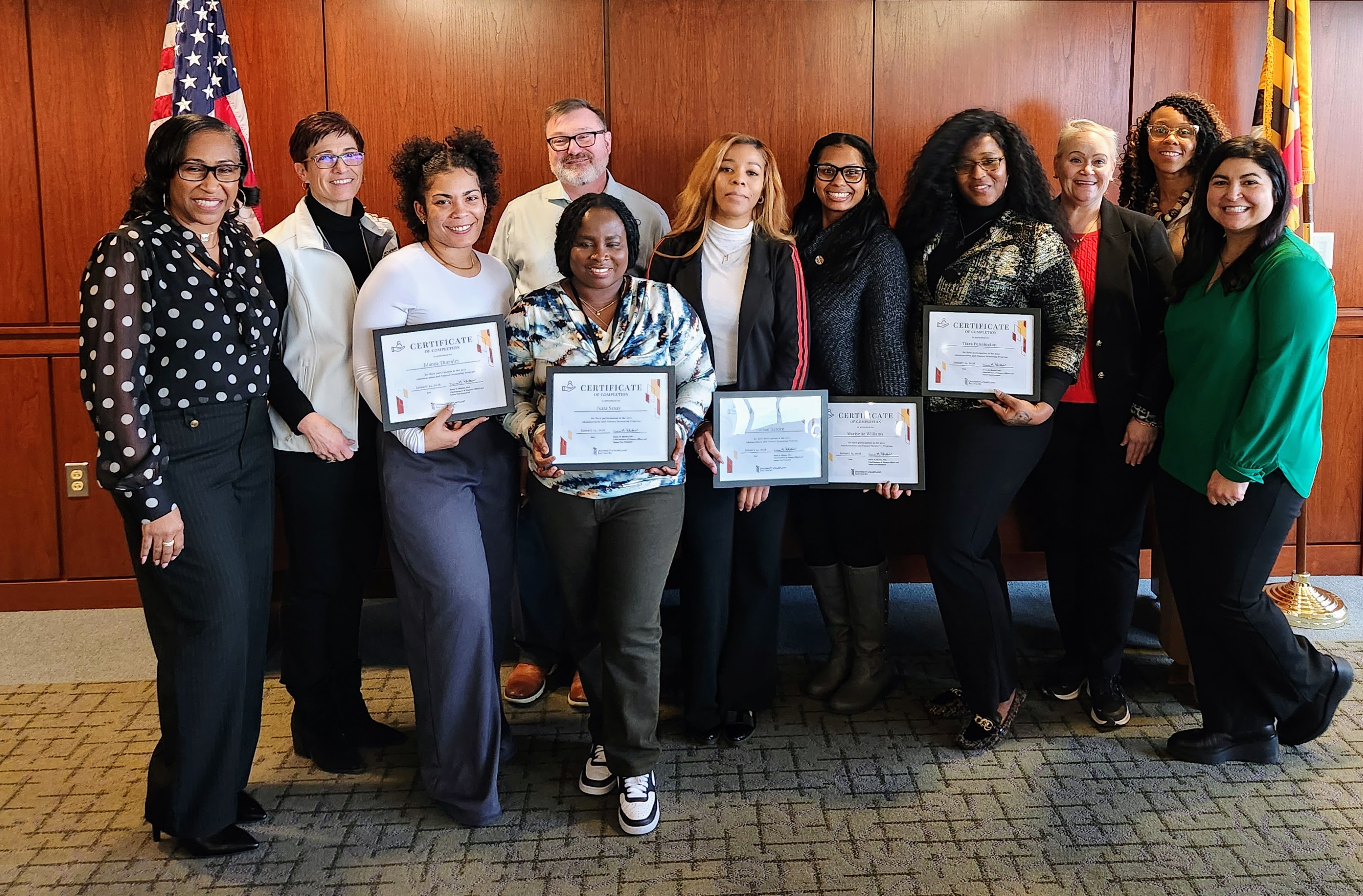 Members of the A&F mentorship program pose with their certificates