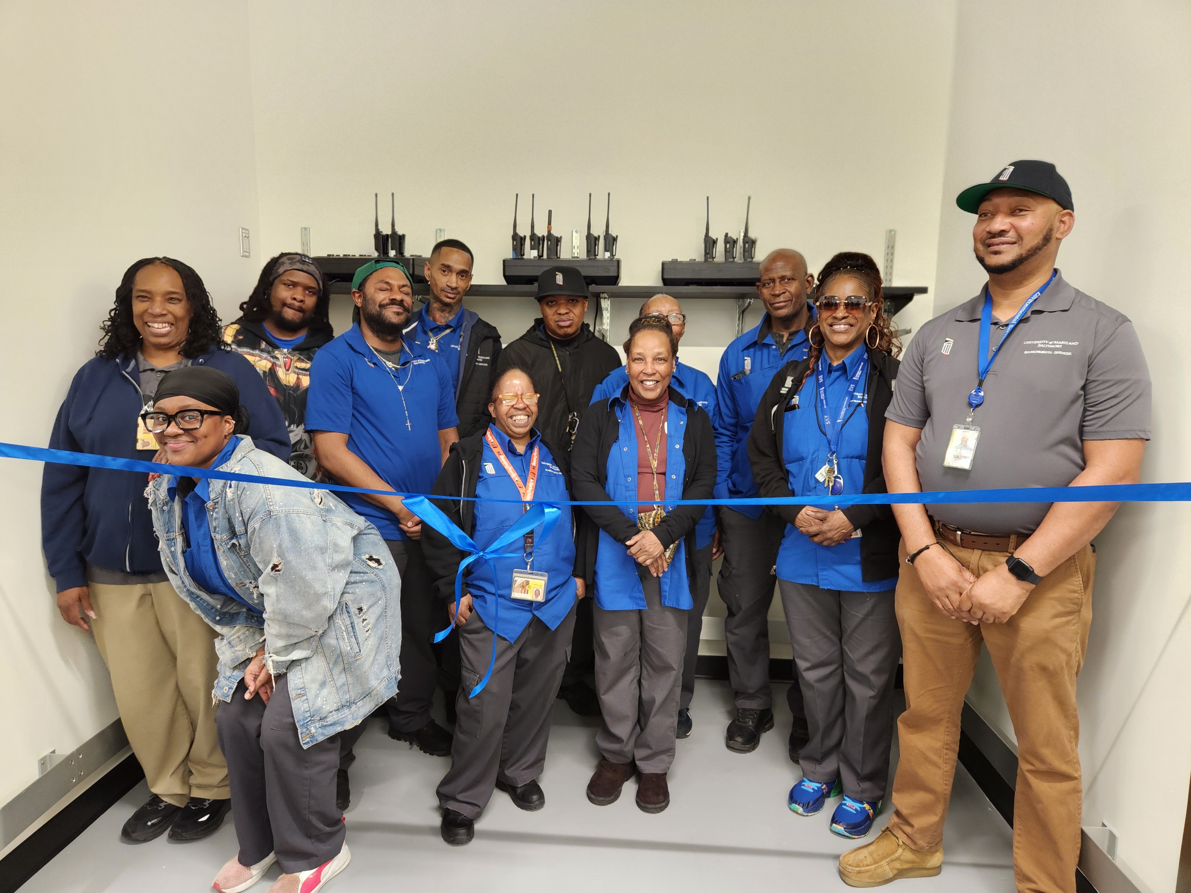 EVS employees prepare for the ribbon cutting for the new break room
