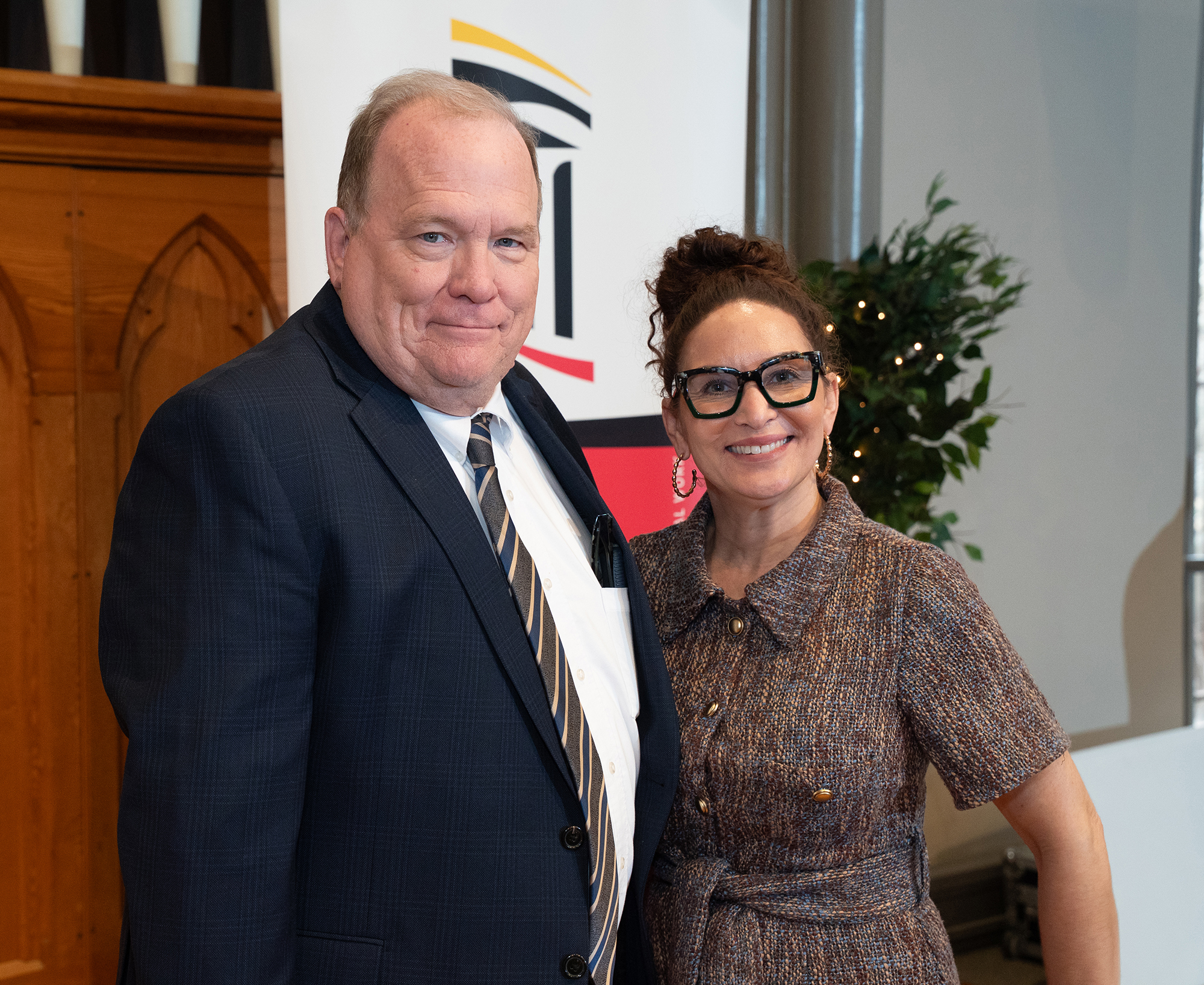 Nicole Palmore poses with her USM award