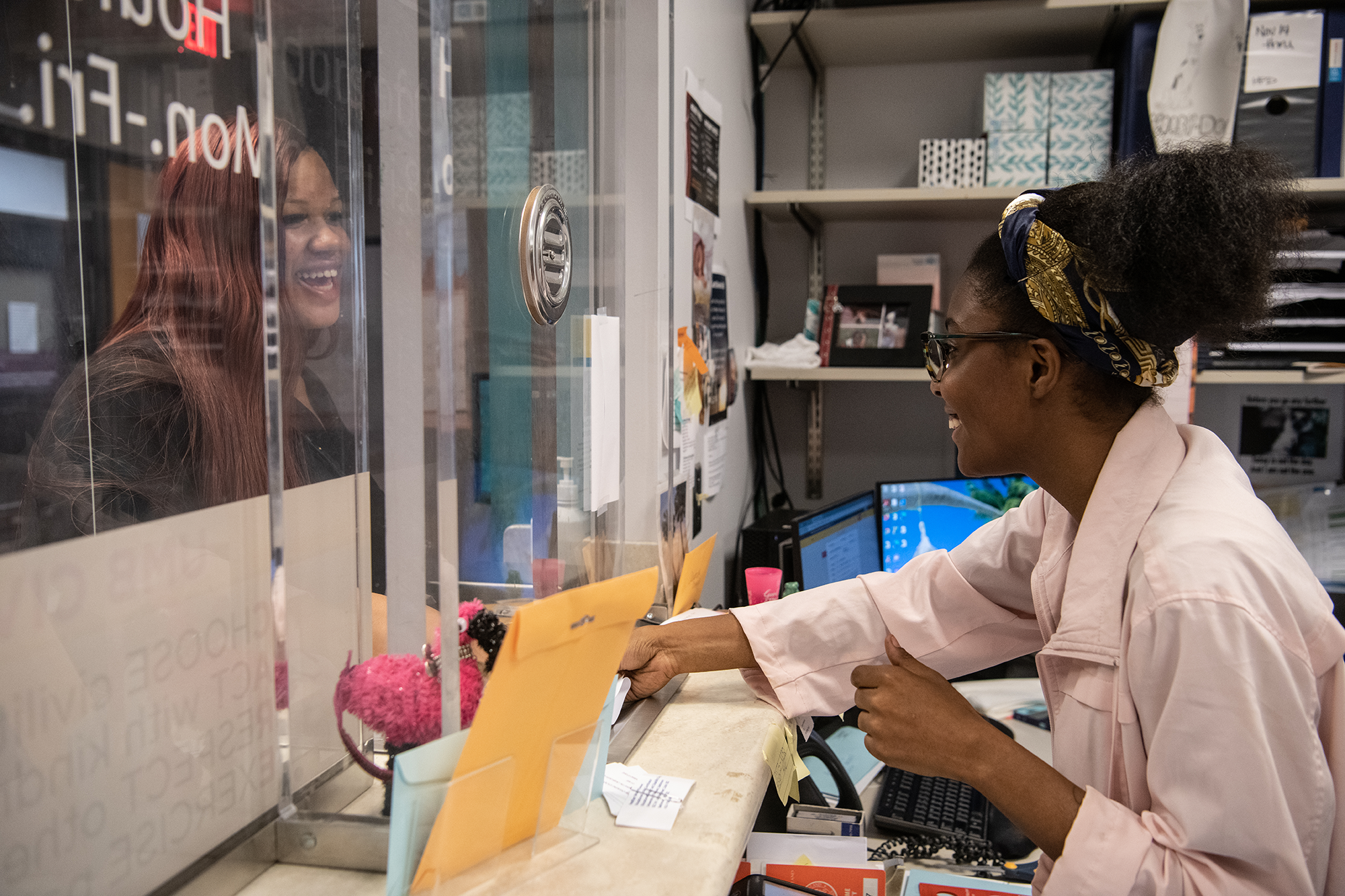 A person giving money to a person