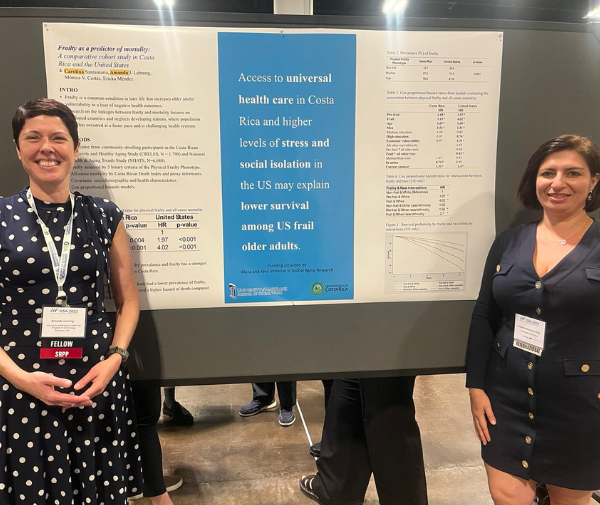 Amanda Lehning and Carolina Santamaria pose with their joint poster