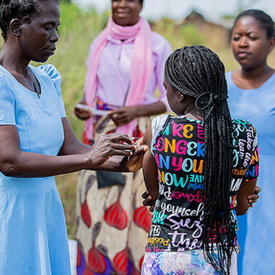 A young girl receives a vaccine