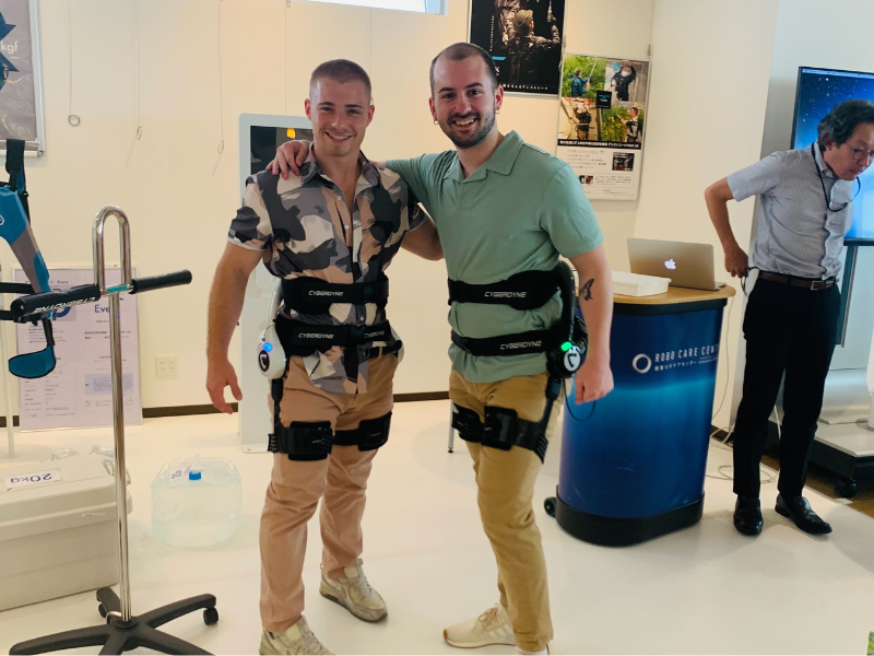 Two students pose together in Japan