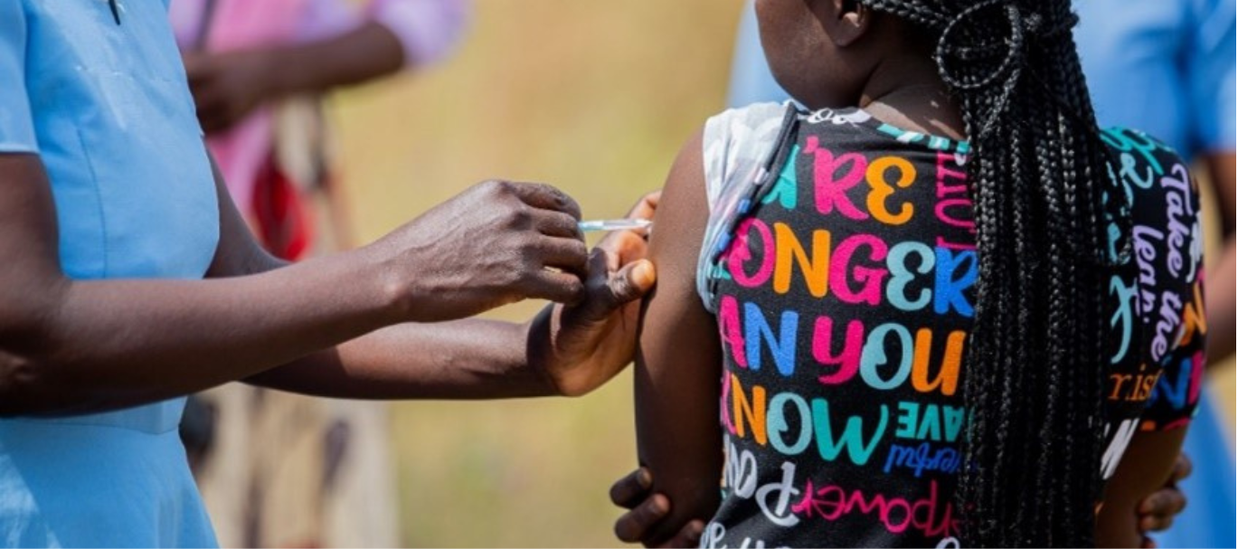 A child in Malawi receives a vaccine