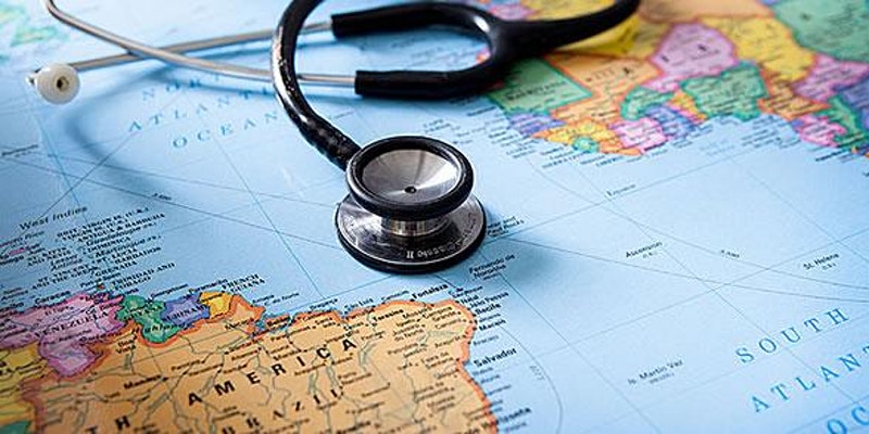 Stethoscope lays on top of a map