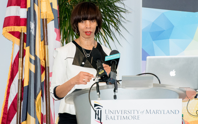 Baltimore Mayor Catherine Pugh praised the University of Maryland, Baltimore (UMB) for its effort to encourage employees to “Live Near Your Work” in remarks on Jan. 9 at the University of Maryland Biopark.