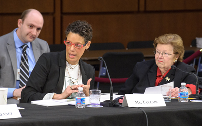 Henriette Taylor and Sen. Barbara A. Mikulski at a hearing, courtesy Senate Photographic Services.