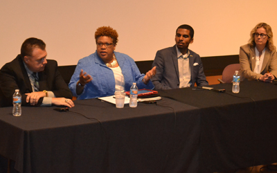 Panelists at the UMB Race Forum were led by moderator Megan Meyer, MSW, PhD, associate dean for academic affairs, UM School of Social Work, right.
