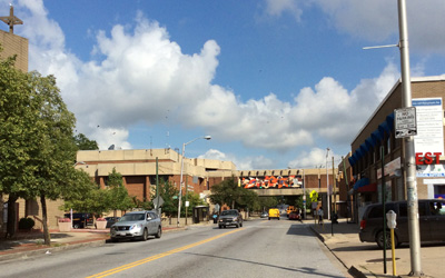 A bridge spans Pennsylvania Avenue to connect the Furman L. Templeton Preparatory Academy and the Marshall Recreation Center in the Upton/Druid Heights neighborhood of Baltimore.