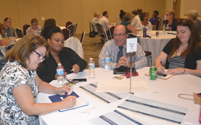Middle States Town Hall volunteers discuss the recommendations of the working group on community engagement.