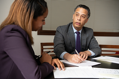 A student looking at papers