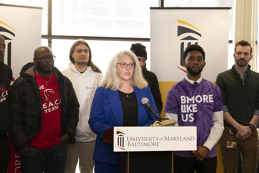 A speaker behind a podium